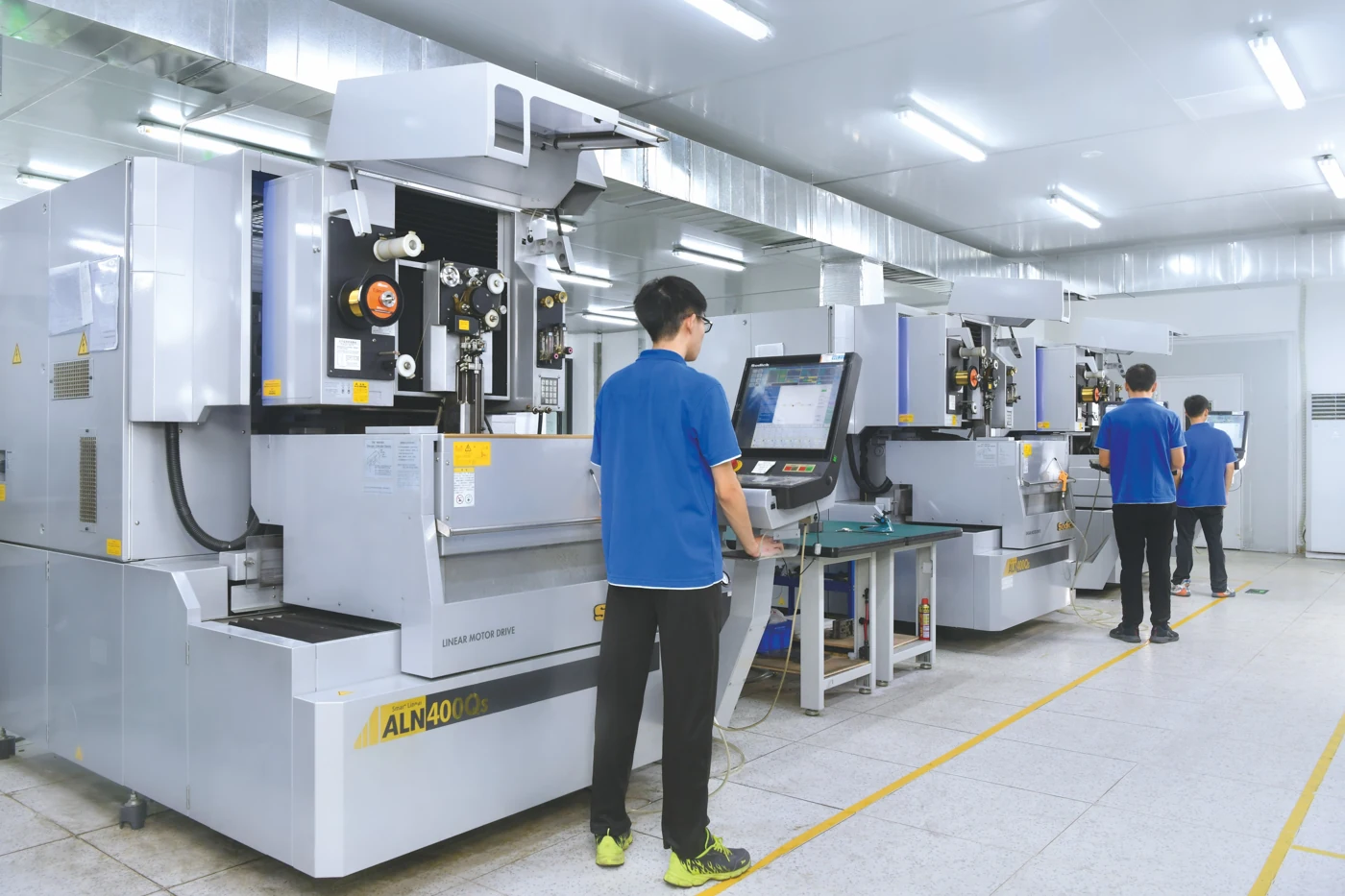 Wire-cutting equipment and operator in an existing catalog photograph