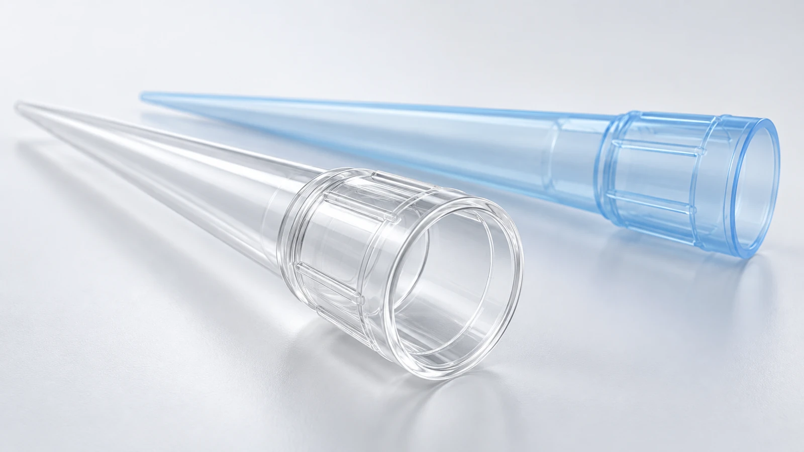 AI concept showing attachment openings on clear and pale blue pipette tips