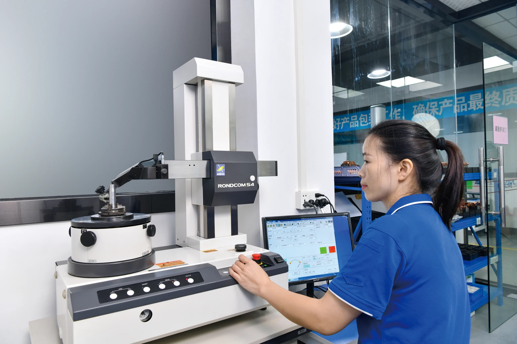 Quality technician measuring a precision component