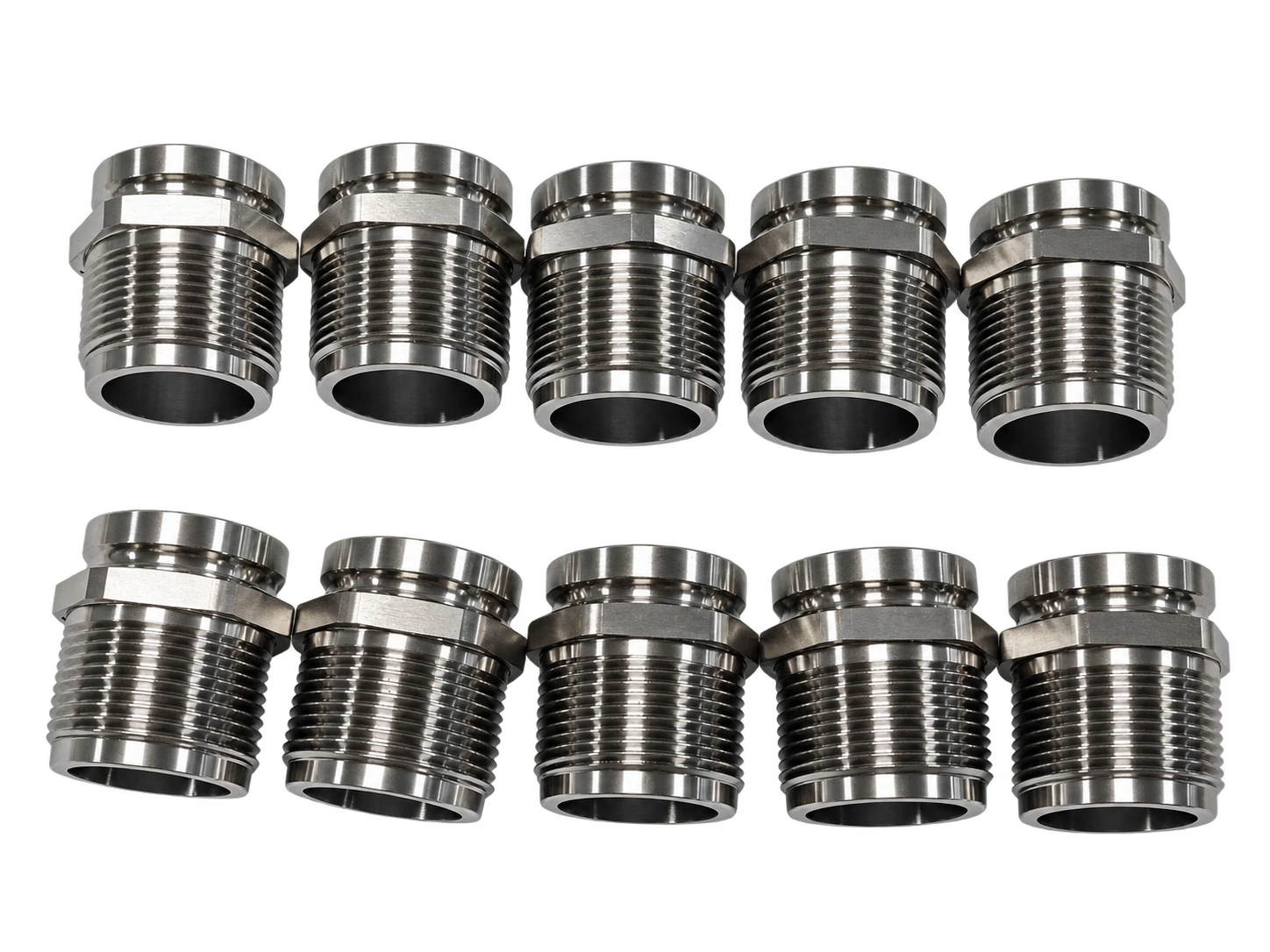 Short metal sleeve examples with visible bores and stepped profiles